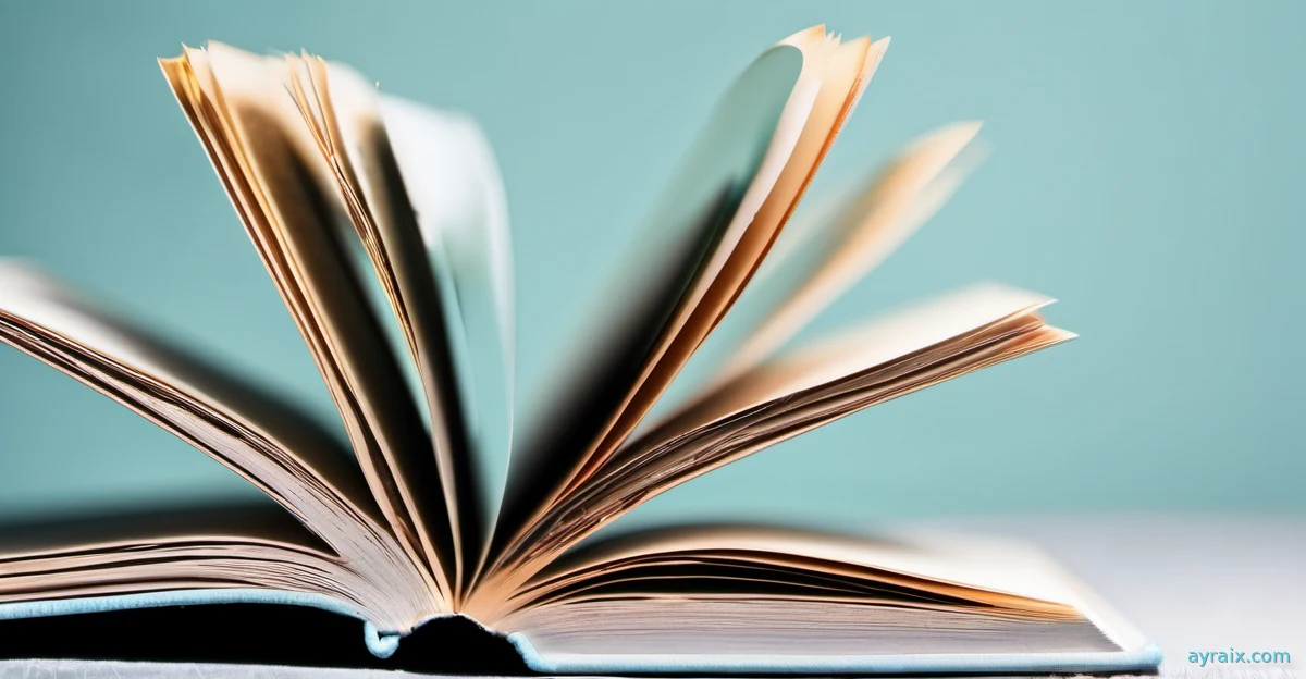 Macro photo of an open book with blank blurred pages catching soft cyan light