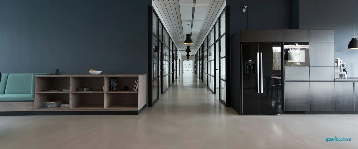 Glass-walled office rooms along a shared corridor — ayraix.com