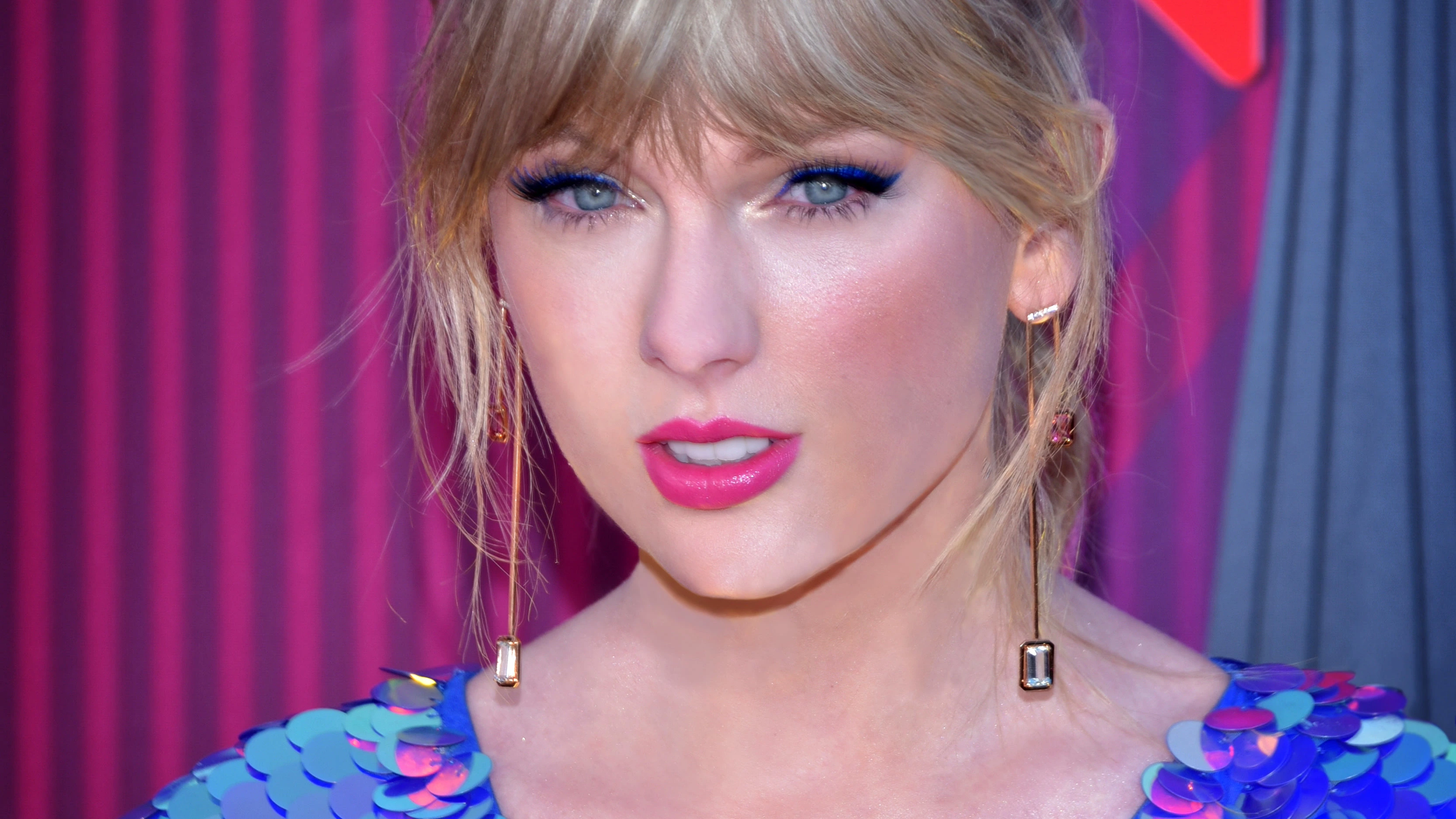 Taylor Swift at the 2019 iHeartRadio Music Awards, featured in a Swiftonomics analysis of the Eras Tour economy